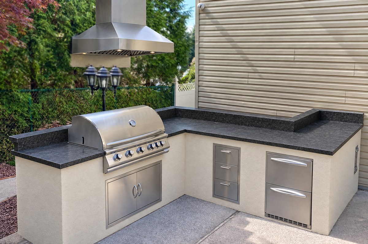 A rendering of an outdoor kitchen painted into a homeowner's photo